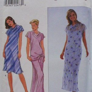 May include: A sewing pattern for three dresses. The pattern is for sizes 6, 8, and 10. The dresses are a striped dress, a dress with a cowl neck, and a floral print dress.