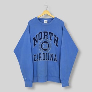 Vintage University of North Carolina blå tröja XL UNC Tar Heels stavade logotyp tröja North Carolina Tar Heels NCAA Crewneck XL bild 1