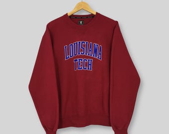 Moletom vermelho vintage da Louisiana Tech University, tamanho M. Moletom com o nome da Louisiana Tech University em destaque. Moletom com gola redonda Louisiana Tech Bulldogs NCAA, tamanho M.