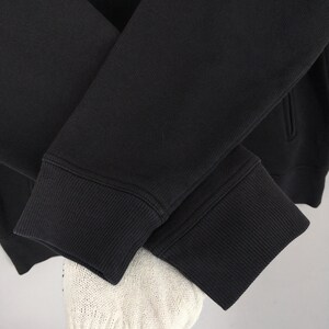 May include: A set of three ceramic mugs with a speckled, matte finish in cream, light brown, and dark brown. Each mug has a simple design and a rounded handle. Suitable for tea or coffee, these mugs offer a minimalist aesthetic.