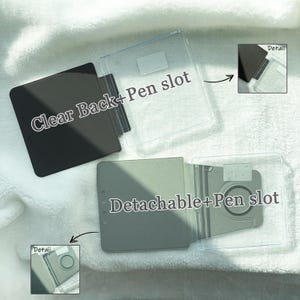 May include: Two tablet cases with clear backs and integrated pen slots. The top case is solid black, while the bottom case is grey and features a detachable design with a circular magnetic charging area. Both include small inset detail views.