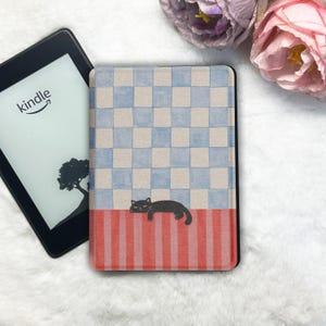 May include: A set of three ceramic mugs with a speckled, matte finish. The mugs are in shades of cream, light gray, and dark gray. Each mug has a simple, minimalist design, perfect for coffee or tea.