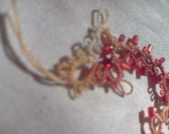 Tatted Lace Greater Spiny Desert Dragon Book Wyrm or cream and orange decorative motif