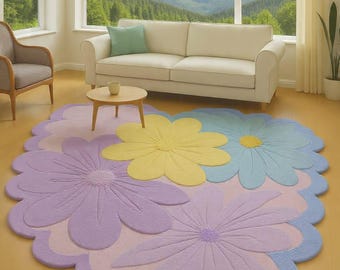 May include: A large, floral-shaped area rug with a scalloped edge. The rug features large flower designs in shades of purple, yellow, and blue. The rug is placed on a light-colored wooden floor in a living room setting.