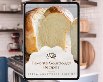 Könnte beinhalten: Ein digitales Tablet, das ein Rezeptbuch-Cover mit dem Titel Favorite Sourdough Recipes von Erica @Buttered Side Up anzeigt. Der Bildschirm zeigt ein hochauflösendes Foto eines goldbraunen Sauerteigbrots mit weichem, luftigem Inneren.