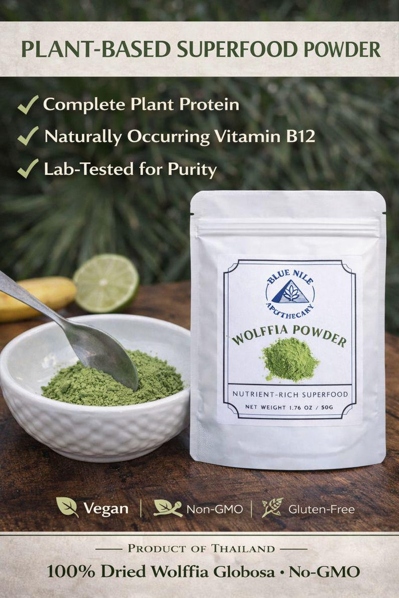 May include: A white pouch of "WOLFFIA POWDER" with a green powder inside, next to a bowl of the same powder. The text reads "PLANT-BASED SUPERFOOD POWDER", "Vegan", "Non-GMO", and "Gluten-Free". The net weight is 1.76 oz / 50g.