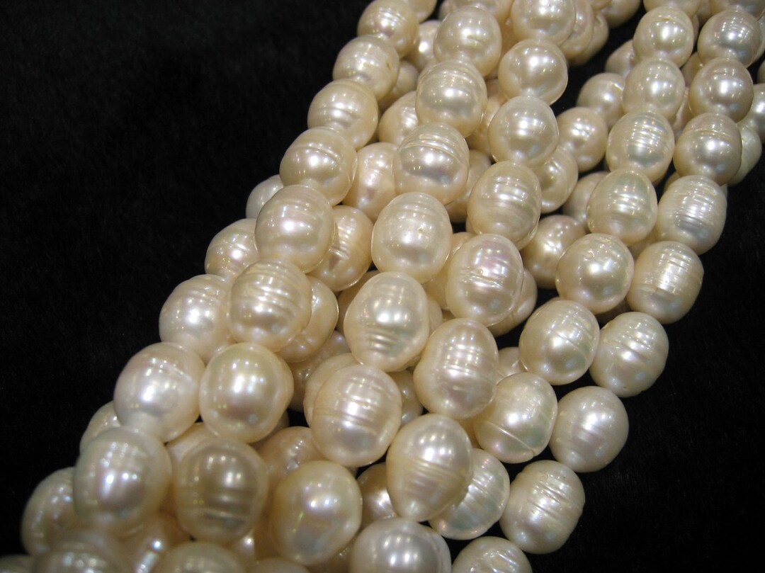 Full Strand Large White Baroque Rice Shaped Freshwater Pearls With ...