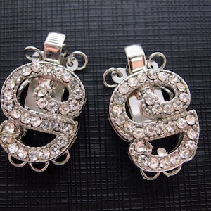 Hermoso cierre en forma de S con diamantes de imitación de 3 hebras - Juego de 2