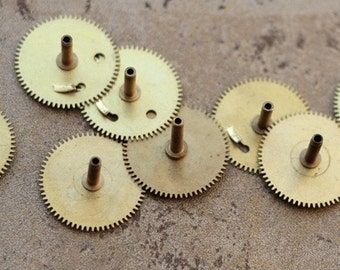 Vintage clock brass gears -- set of 8 -- D6
