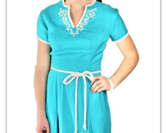 1960s Turquoise Wiggle Dress by Bea Young - Size 12 - White Trim, Pleats, and Playful Pattern - Necessity of Life Fashions - Great Summer Pc