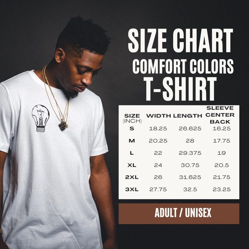 K&ouml;nnte beinhalten: Ein wei&szlig;es T-Shirt mit einer kleinen schwarzen Gl&uuml;hbirnengrafik auf der Brust. Daneben befindet sich eine Gr&ouml;&szlig;entabelle f&uuml;r Comfort Colors T-Shirts, die die Gr&ouml;&szlig;en S bis 3XL mit Ma&szlig;en in Zoll f&uuml;r Breite, L&auml;nge und &Auml;rmelmitte am R&uuml;cken auflistet.
