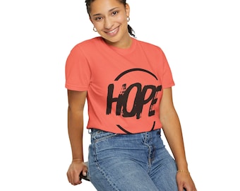 Camiseta unisex con frase inspiradora y mensaje positivo, teñida en prenda, con estampado motivador. Ideal para quienes buscan una prenda sin género.