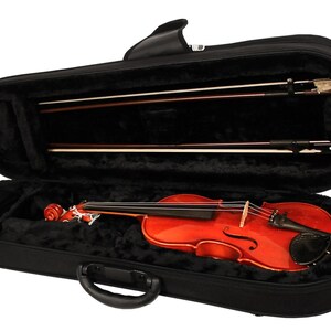 May include: A violin in a black case with a handle. The violin is a reddish-brown color and has a black fingerboard. Two violin bows are stored in the case. The interior of the case is lined with black plush material.