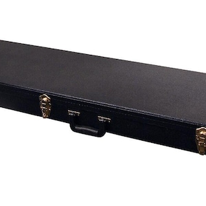 May include: Black rectangular case with gold-colored latches and a handle. The case has a textured surface and a small gold-colored nameplate. The case is designed to hold a long, narrow object.