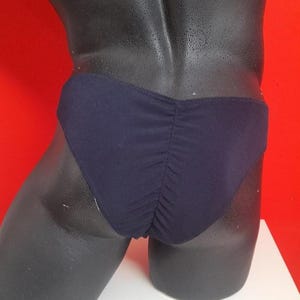 Zeer mooie sportonderbroek/zwembroek, met bandjes van ongeveer 32 mm.