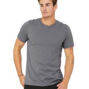 May include: A charcoal gray short-sleeved t-shirt with a crew neck.