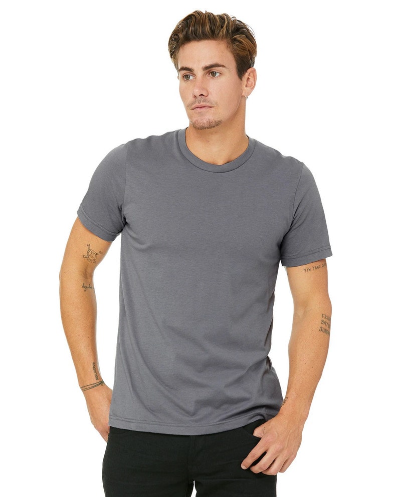 May include: A charcoal gray short-sleeved t-shirt with a crew neck.