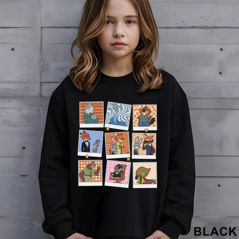 May include: Black sweatshirt featuring a grid of cartoon character images in a polaroid style. The images include various anthropomorphic animals. The word "BLACK" is printed in white at the bottom right corner.