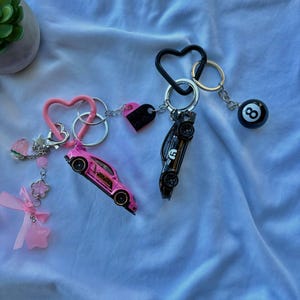 couple hot wheels porsche 911 gt3 keychains image 2