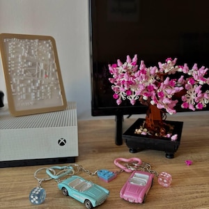 Barbie couple hot wheels keychains