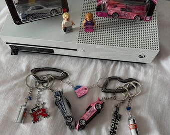 Couple things. Fast&Furious keychains. HondaS2000. Nissan skyline gt-r