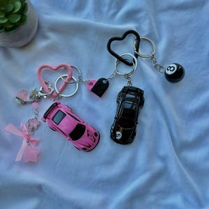 couple hot wheels porsche 911 gt3 keychains