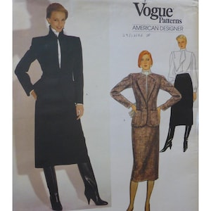 May include: Vogue Patterns American Designer sewing pattern featuring three women's suit designs. The suits include a black skirt suit with a high collar jacket, a brown tweed skirt suit, and a white blouse with a black skirt. The pattern number is 29/2182.