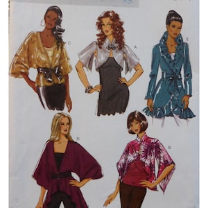 May include: A pattern sheet featuring illustrations of five different women's jackets and boleros. The designs include a gold wrap top with a black bow, a silver bolero, a teal wrap jacket, a burgundy top with a belt, and a pink floral bolero.