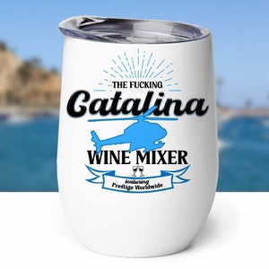 May include: White stainless steel wine tumbler with a blue helicopter graphic and the text "The Fucking Catalina Wine Mixer featuring Prestige Worldwide".