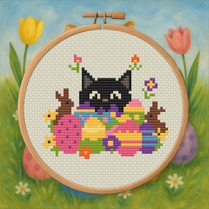 May include: Cross-stitch embroidery in a wooden hoop featuring a black cat peeking over colorful Easter eggs. Brown bunnies and flowers are also included in the design. The background shows a spring scene with tulips and daisies.