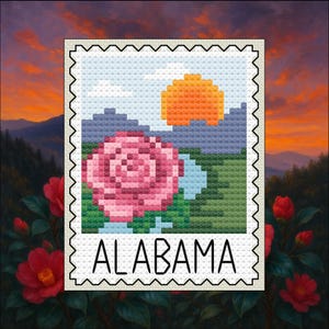 May include: A cross-stitch design featuring a pink rose, sun, and mountains, set against a sky background. The word "ALABAMA" is displayed below the image within a postage stamp frame. The background features a sunset and red flowers.