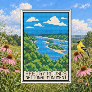 May include: A cross-stitch pattern featuring a landscape of the Effigy Mounds National Monument. The design shows a blue river winding through green hills under a blue sky with white clouds. The text reads Effigy Mounds National Monument.