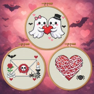 May include: Three cross-stitch embroidery hoops with Halloween and Valentine's Day themes. One features two ghosts holding a heart, another a skull-sealed letter, and the last a red heart with a spiderweb design.