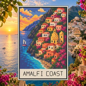 May include: A cross-stitch pattern featuring a pixelated landscape of the Amalfi Coast. The design displays colorful houses built into a cliffside, a blue sea with a small sailboat, and a sunset sky. The text AMALFI COAST is printed at the bottom.