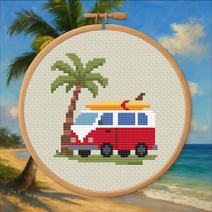 May include: Cross-stitch embroidery in a wooden hoop featuring a red and white van with a surfboard on top, parked near a palm tree. The background shows a beach scene with blue skies and ocean waves. The design evokes a beach vacation theme.