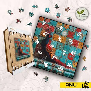 May include: A wooden XL puzzle box featuring a colourful image of a pheasant on a tiled surface. The puzzle is partially assembled, with scattered pieces. The image includes the text "PNU" and an "Eco Friendly" logo.