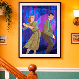 May include: Framed art print featuring a stylized illustration of a couple dancing. The artwork has a blue and purple background with the couple in shades of green and brown. The print is in a black frame.