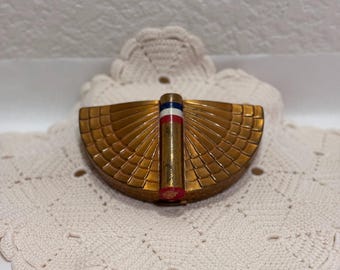 Estuche compacto triple Coty Flying Colors de 1942, estilo militar patriótico de la Segunda Guerra Mundial.