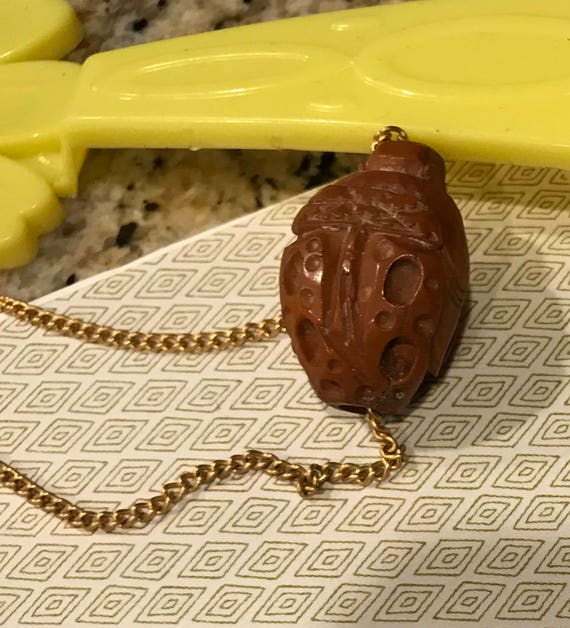 Interesting old carved wood or nut bead on gold t… - image 3
