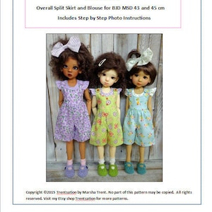 May include: Three dolls wearing different patterned dresses. The dolls are wearing purple, green, and blue dresses with floral and butterfly patterns. The dolls are standing on a wooden surface. The image includes the text "Trentsation by Marsha Trent" and "Pattern MSD14".