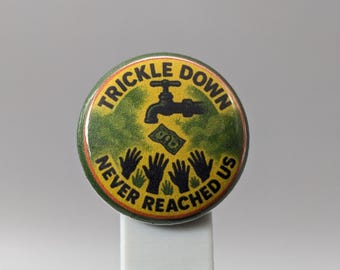 Trickle Down Never Reached Us – 1" Button (Design 5.4) – Power & Corruption Series