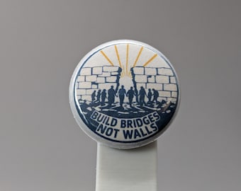 Build Bridges Not Walls – 1" Button (Design 3.2) – People Over Borders Series