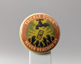 Trickle Down Never Reached Us – 1" Button (Design 5.3) – Power & Corruption Series