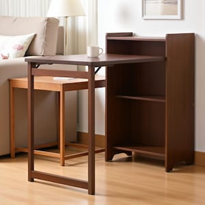 May include: A dark brown wooden desk with a built-in bookshelf. The desk has a rectangular tabletop and a lower shelf. A small, light-colored table is next to the desk. A white mug sits on the desk. The desk is 30 inches tall.