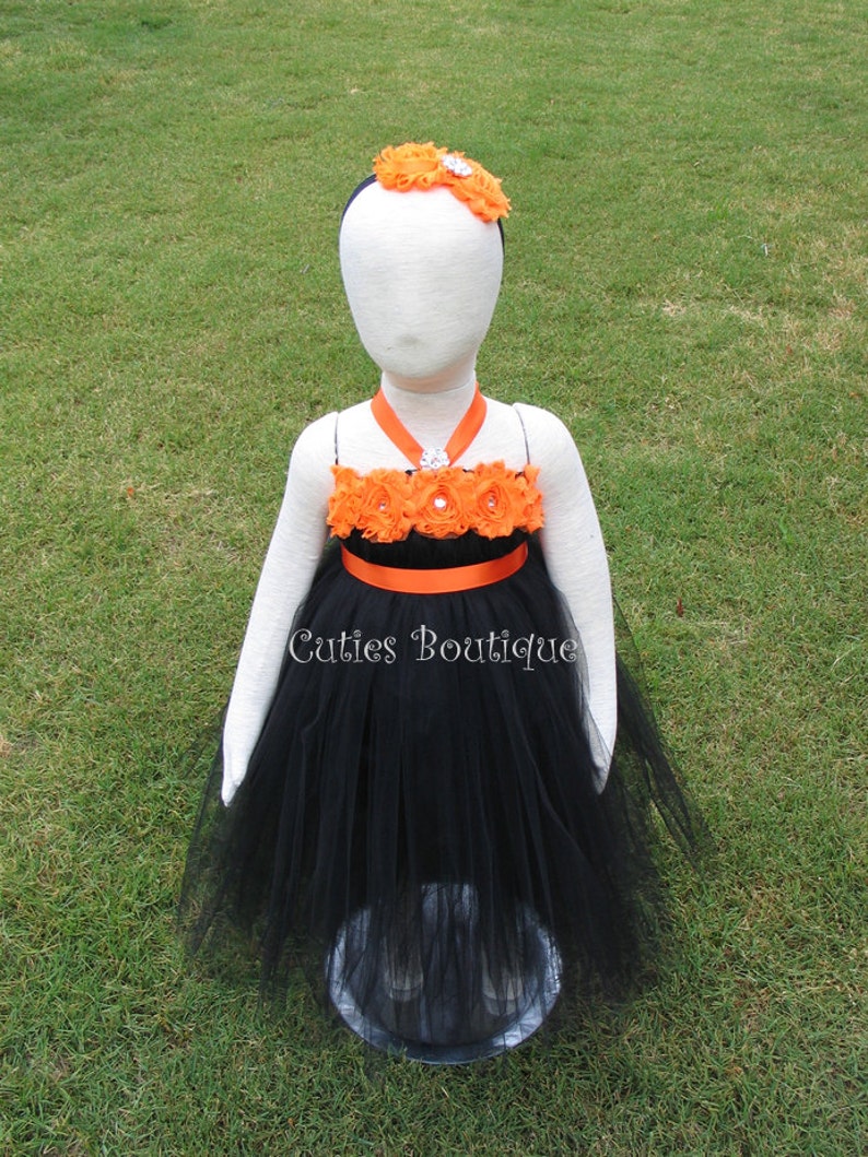 black dress with orange flowers