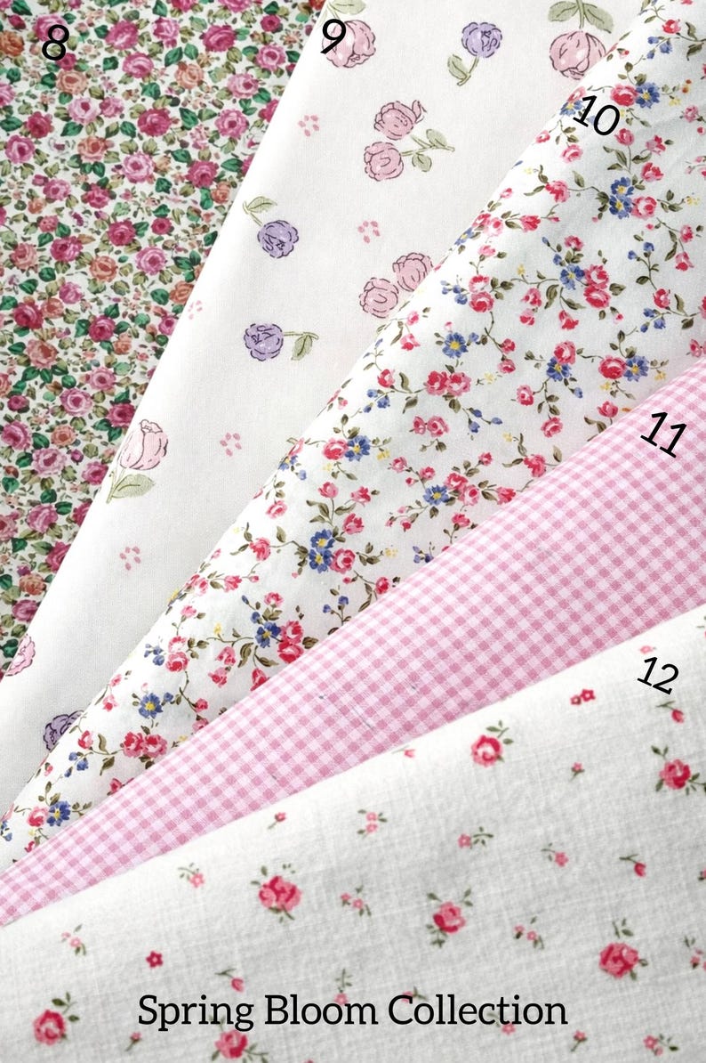 May include: Five folded fabric swatches from the Spring Bloom Collection labeled 8 through 12. Patterns include dense pink roses, scattered purple and pink rosebuds, small red and blue floral prints, a pink gingham check, and tiny red rosebuds.