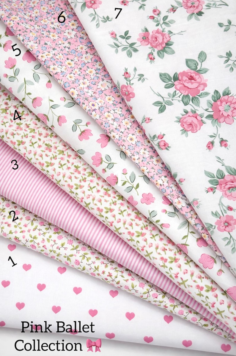 May include: Seven folded fabric swatches from the Pink Ballet Collection, labeled 1 through 7. Patterns include white with pink hearts, pink stripes, and various floral prints featuring pink roses, small blossoms, and green leaves on white backgrounds.