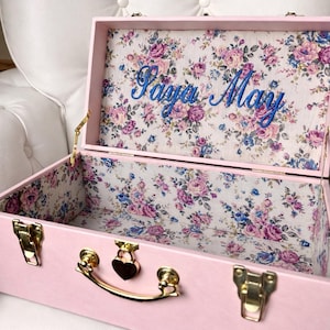 May include: A set of three ceramic mugs with a speckled, matte finish. The mugs are in shades of cream, light gray, and dark gray. Each mug has a simple, minimalist design, perfect for coffee or tea.