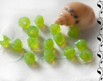 M.C. Perles toupies 4 mm vert pomme 30 pcs.