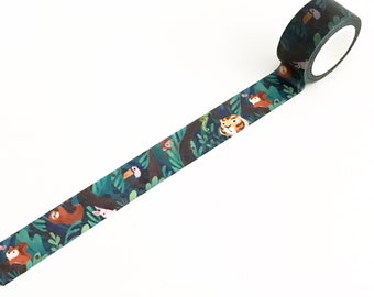 May include: A roll of washi tape with a jungle animal print. The tape features a green, blue, and brown background with images of a toucan, tiger, sloth, monkey, and other animals.